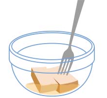 イラスト：高野豆腐にフォークで穴を空けている