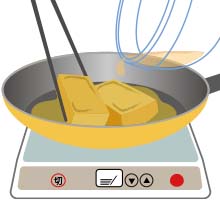 イラスト：焦げ目がついた高野豆腐を裏返している